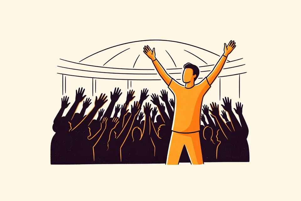 A silhouette of a performer with raised arms on stage, surrounded by a crowd of raised hands, under warm stage lights, with a hint of the stadium's curved roof.