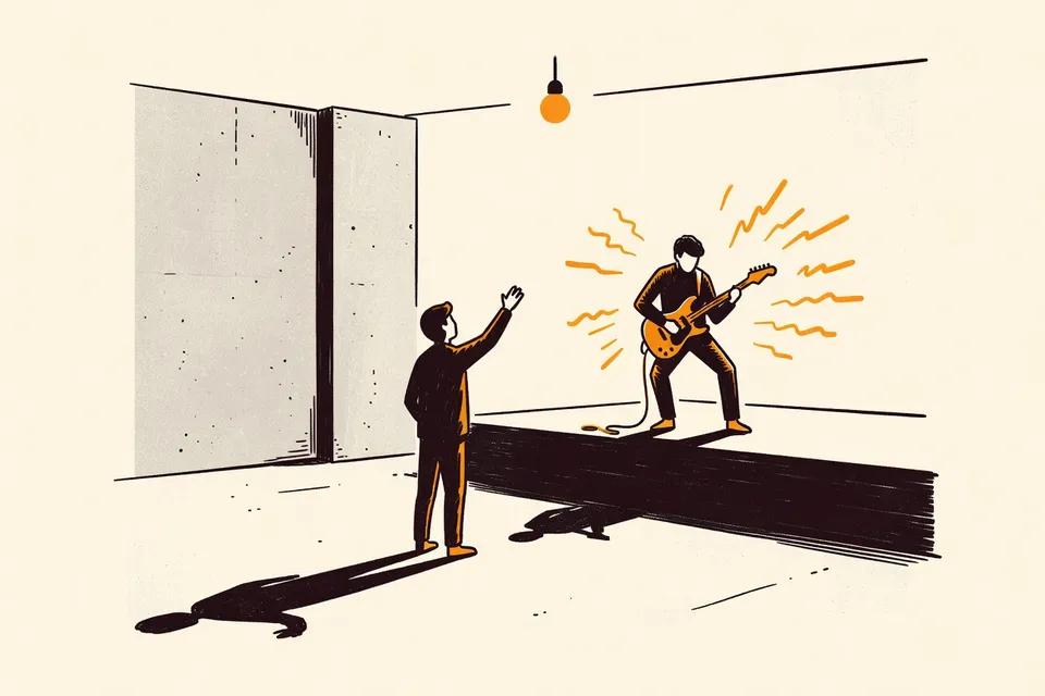 A person stands in a dark, blue-lit room with concrete walls, reaching toward a guitarist on stage who plays a feedback-heavy chord. A single light bulb casts a shadow on the empty floor.
